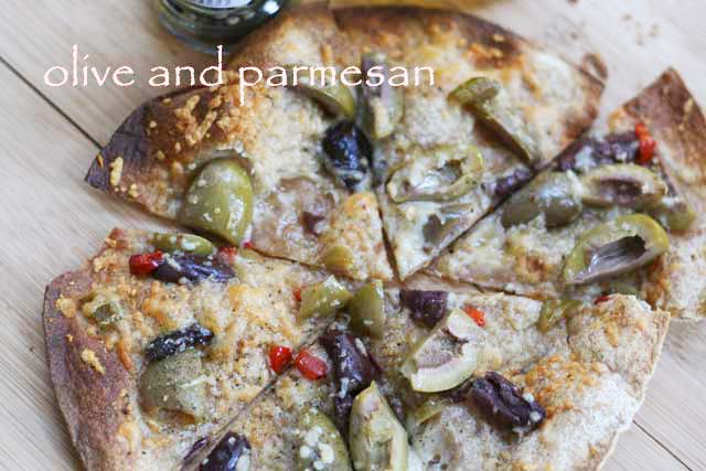 Tortilla shell pizza recipe: Olive and Parmesan cheese. Repin to save!