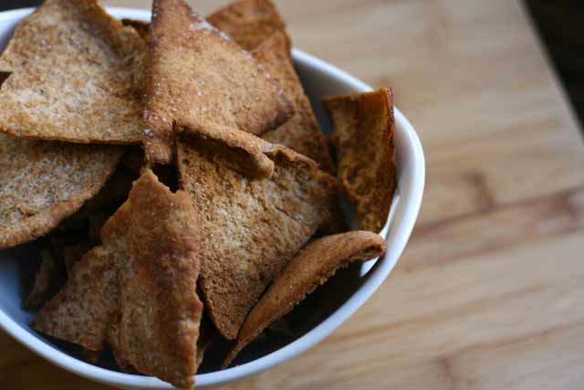 Homemade pita chips from leftover pita bread. So easy and so delicious! Click through for instructions.