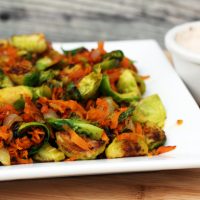 Sweet potato and brussels sprouts hash with chipotle crema recipe: A flavor match made in heaven! click through for recipe.