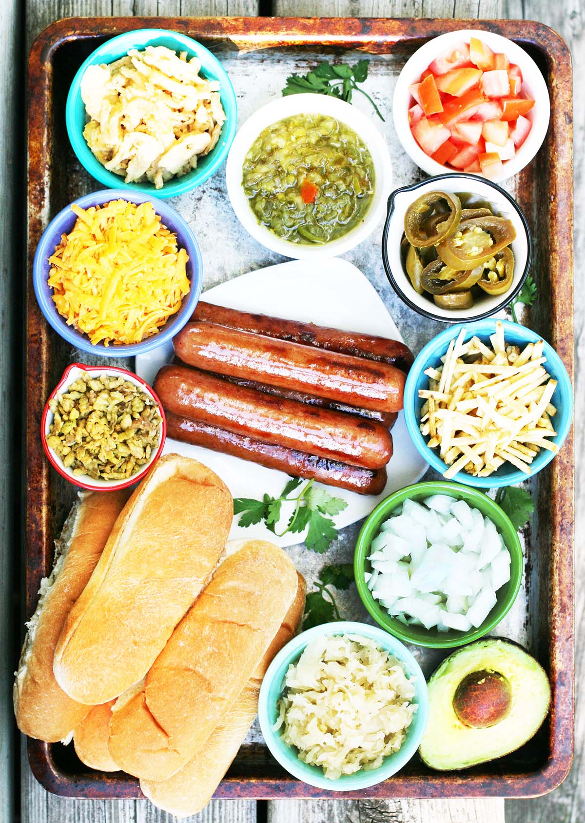 Set up a DIY hot dog bar: Click through for dozens of topping ideas!