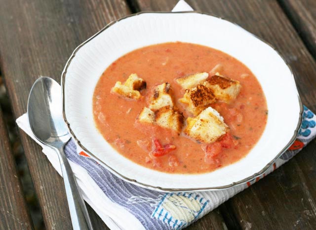 Creamy garlic tomato soup with grilled cheese croutons recipe