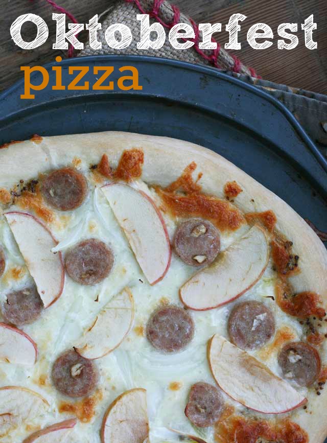 Oktoberfest pizza recipe. This pizza is topped with apples, sausage, mustard, and mozzarella cheese. A great fall pizza!