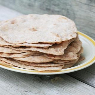 Homemade tortilla shells/burrito shells. Whole wheat and made with coconut oil. Click through for recipe!