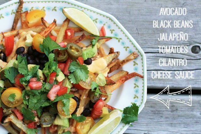 Fries topped with avocado, black beans, tomatoes, cilantro, and more. Click through for recipe!