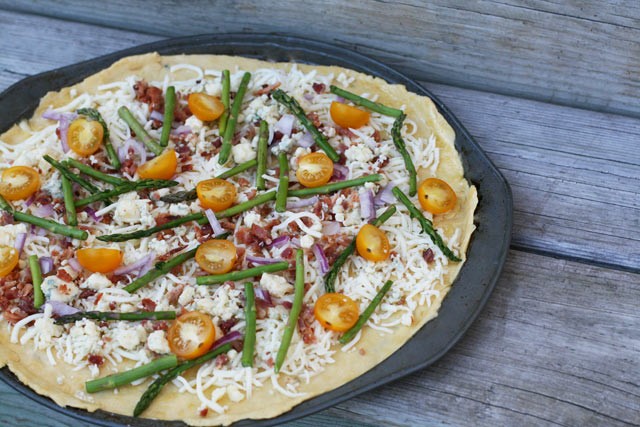 Einkorn wheat pizza crust, with delicious springtime toppings: asparagus, blue cheese, bacon, and more. 