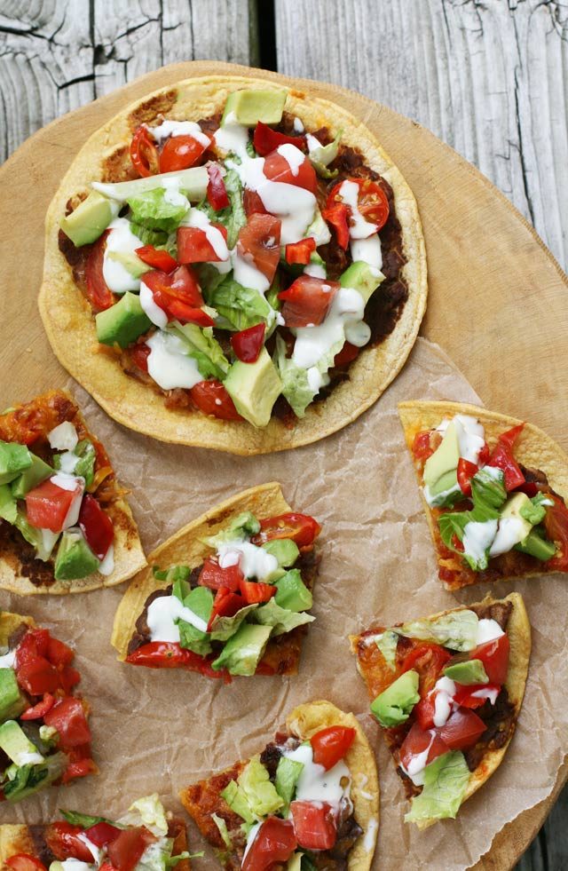 Mexican-style corn tortilla pizzas. Feed a crowd for not a lot of money!