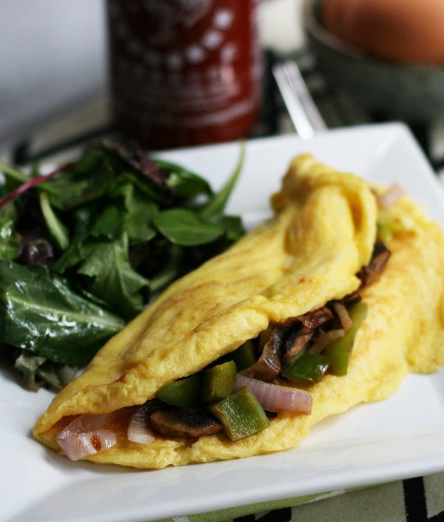 Ever wonder how to make a super fluffy omelette? One simple trick is all it takes. Click through to find out how to make the fluffiest omelette ever!