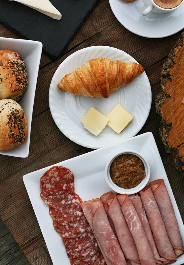 A European-style breakfast, complete with meats, cheeses, and croissants. Click through for more ideas!