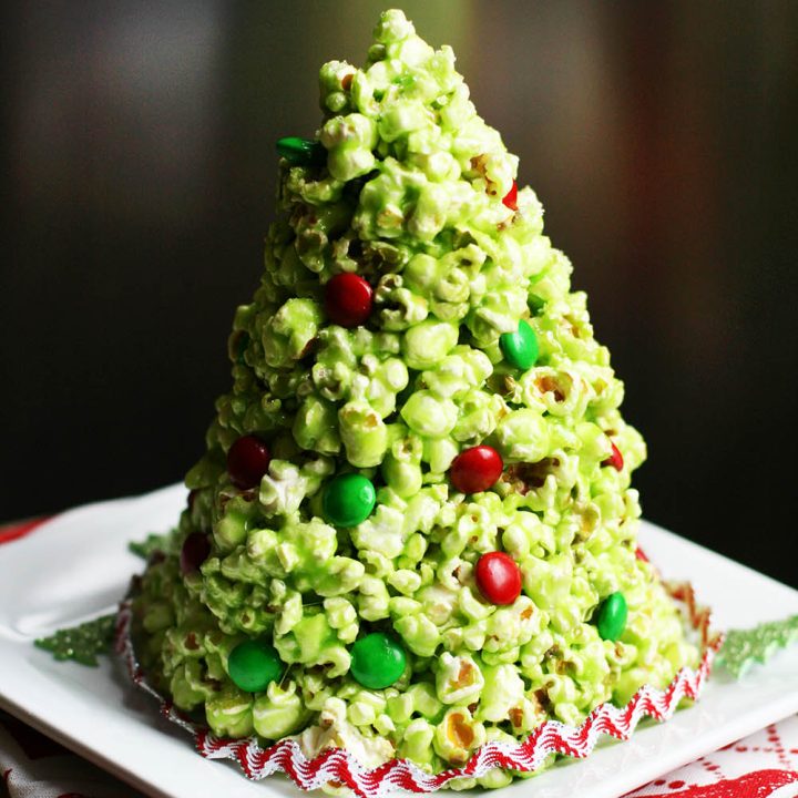 A popcorn Christmas tree! This edible tree is essentially one big popcorn ball. Click through for recipe!