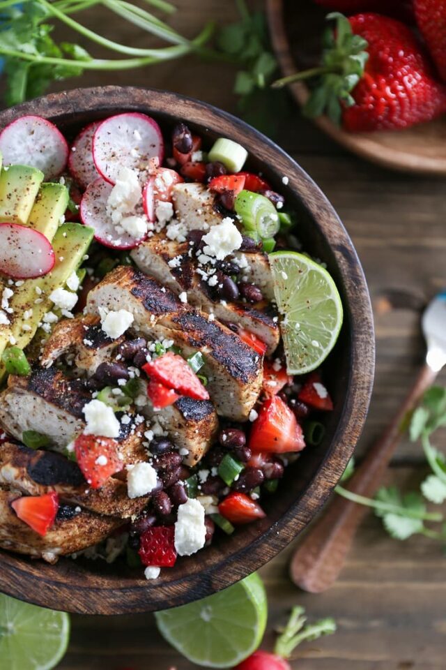 Balsamic grilled chicken salad with strawberry-black bean salsa: A delicious, hearty salad with a burst of freshness from the strawberries.