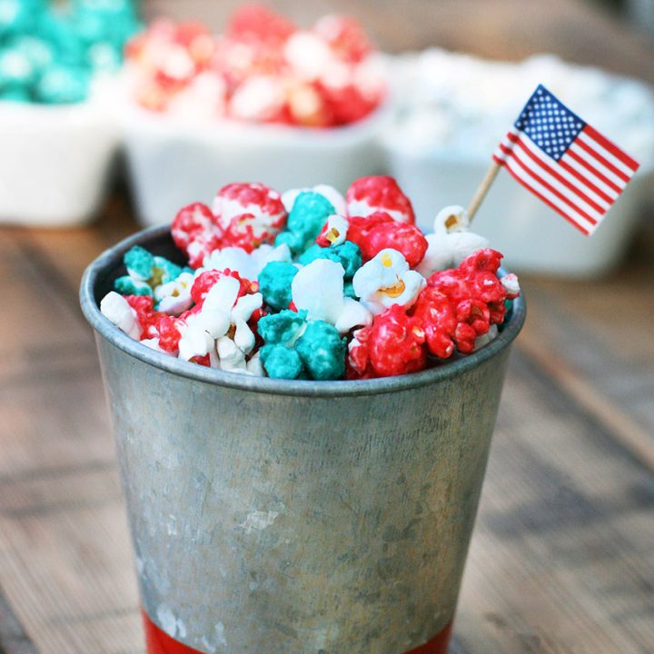 Red, white, and blue popcorn. Learn how to make this patriotic candied popcorn at home!