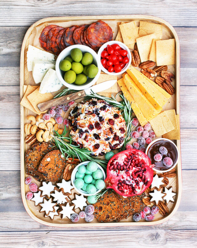 Create a holiday grazing board on a budget! Learn how to assemble a snack board for your Christmas party!