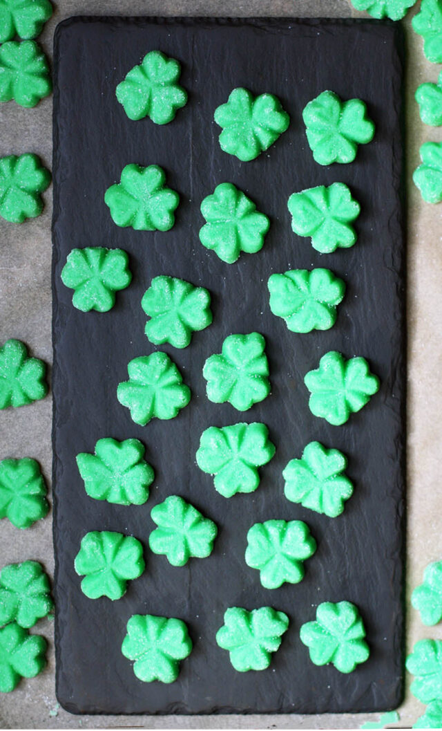Shamrock mints for St. Patrick's Day: Using a cream cheese mint base, plus peppermint and green food coloring.