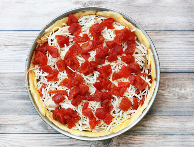 Deep-dish pizza at home: Top with crushed tomatoes for an authentic Chicago-style pie.