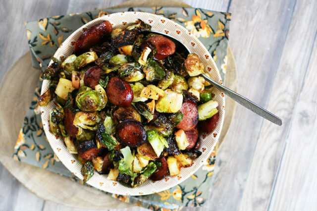 Ring bologna and Brussels sprouts, roasted with a flavorful sauce. Click through for recipe!