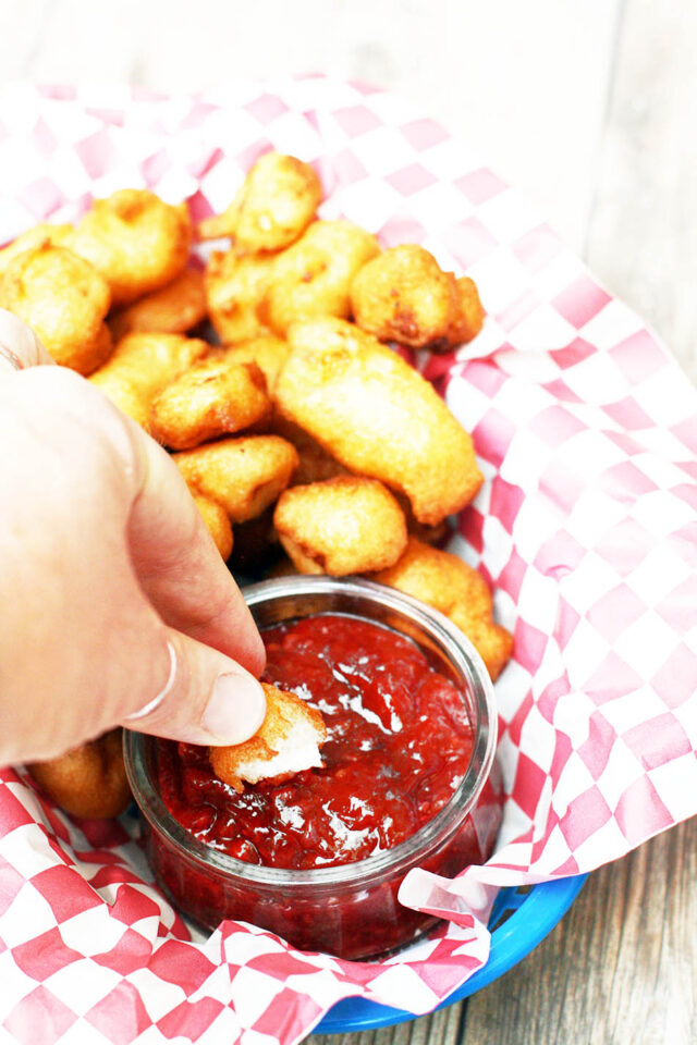 Learn how to make fried cheese curds from fresh cheese curds from Wisconsin! Click through for recipe.