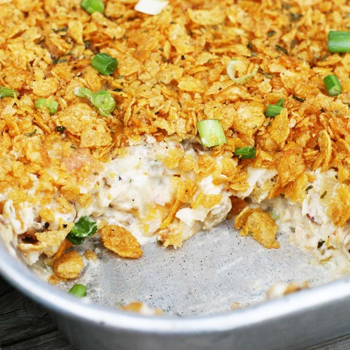 Cheesy breakfast potatoes with a buttery corn flake crust. Click through for recipe.