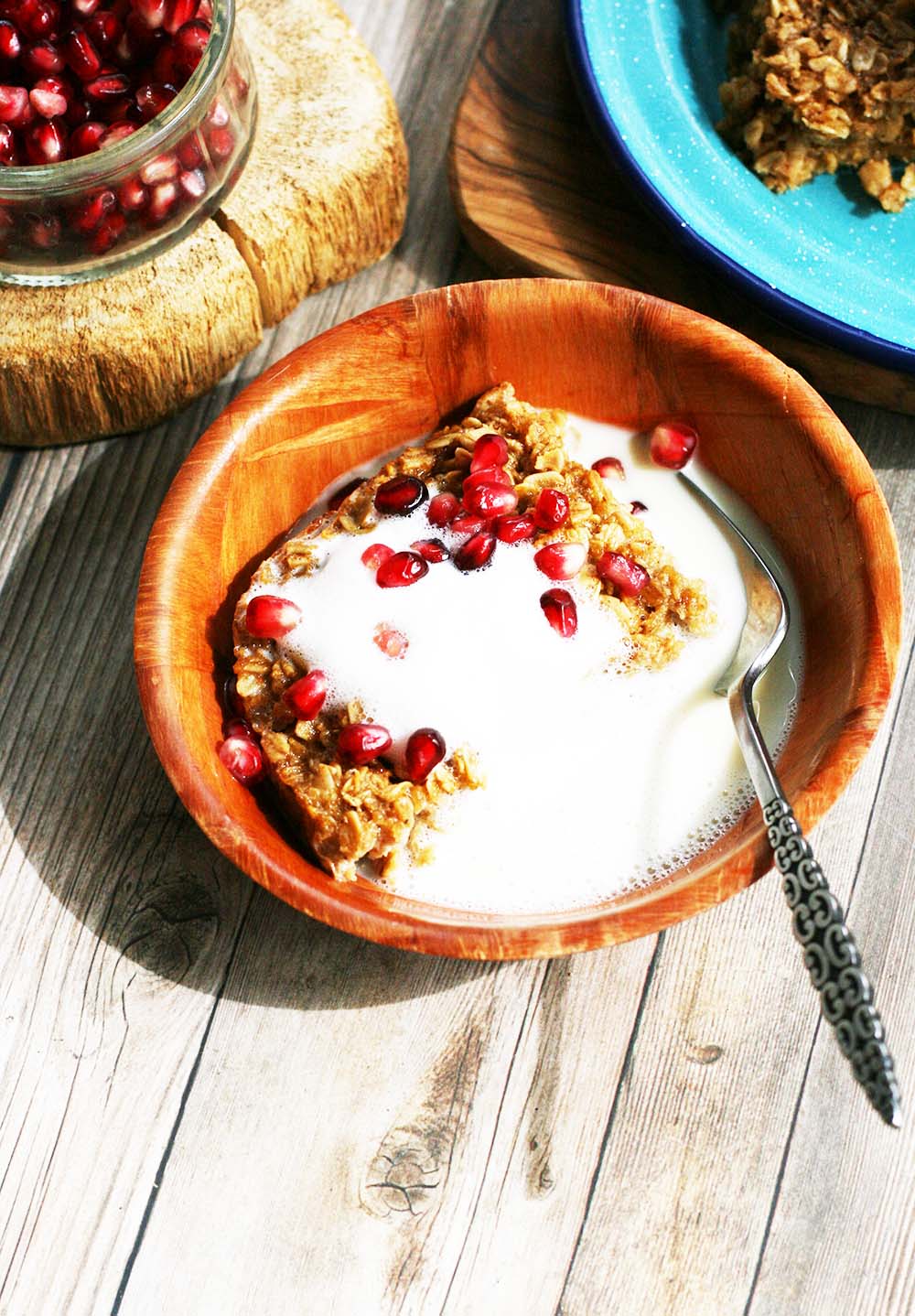 Simple baked oatmeal: Topped with steamed milk and pomegranate arils, or your choice of fresh fruit.