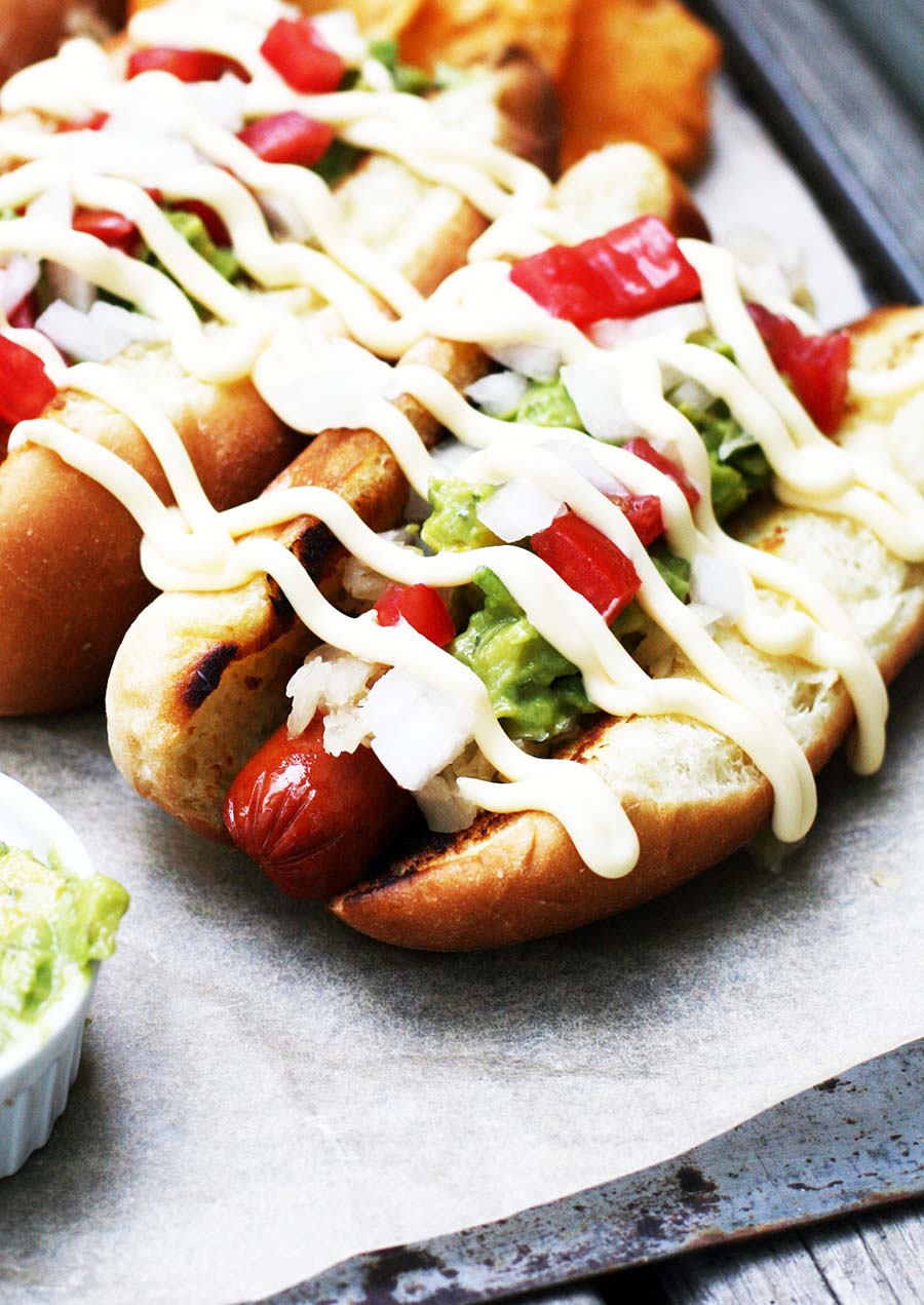 How do they eat hot dogs in Chile? Meet the completo: A hot dog loaded with delicious toppings!
