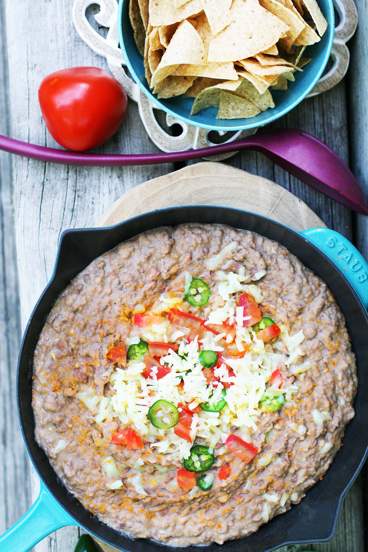 Learn how to make homemade refried beans from scratch. Click through for recipe!