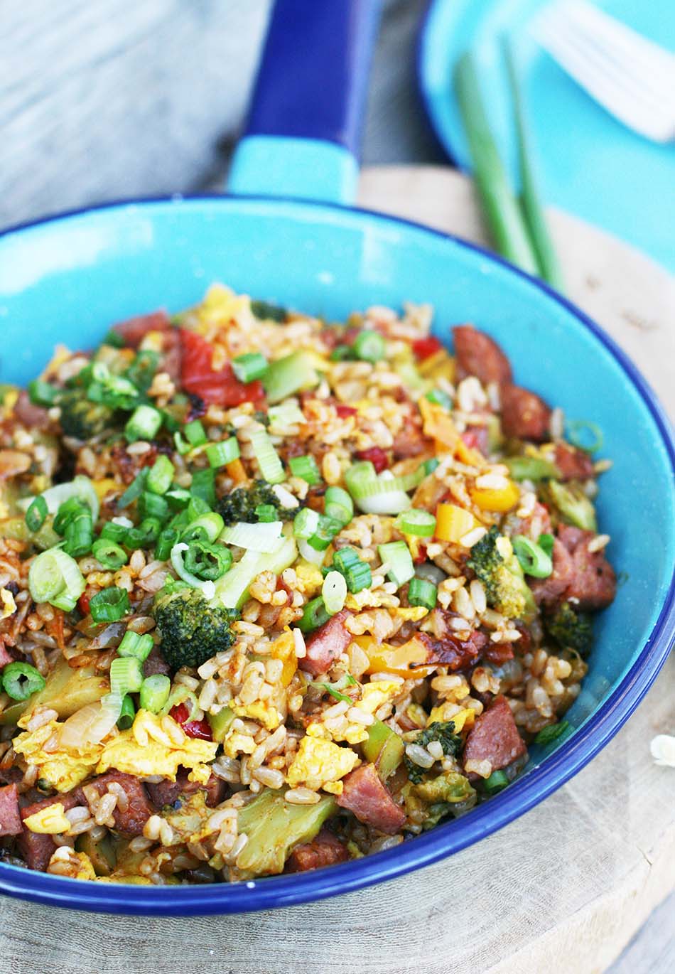Kitchen sink fried rice, with veggies, meat, eggs, and other optional ingredients.