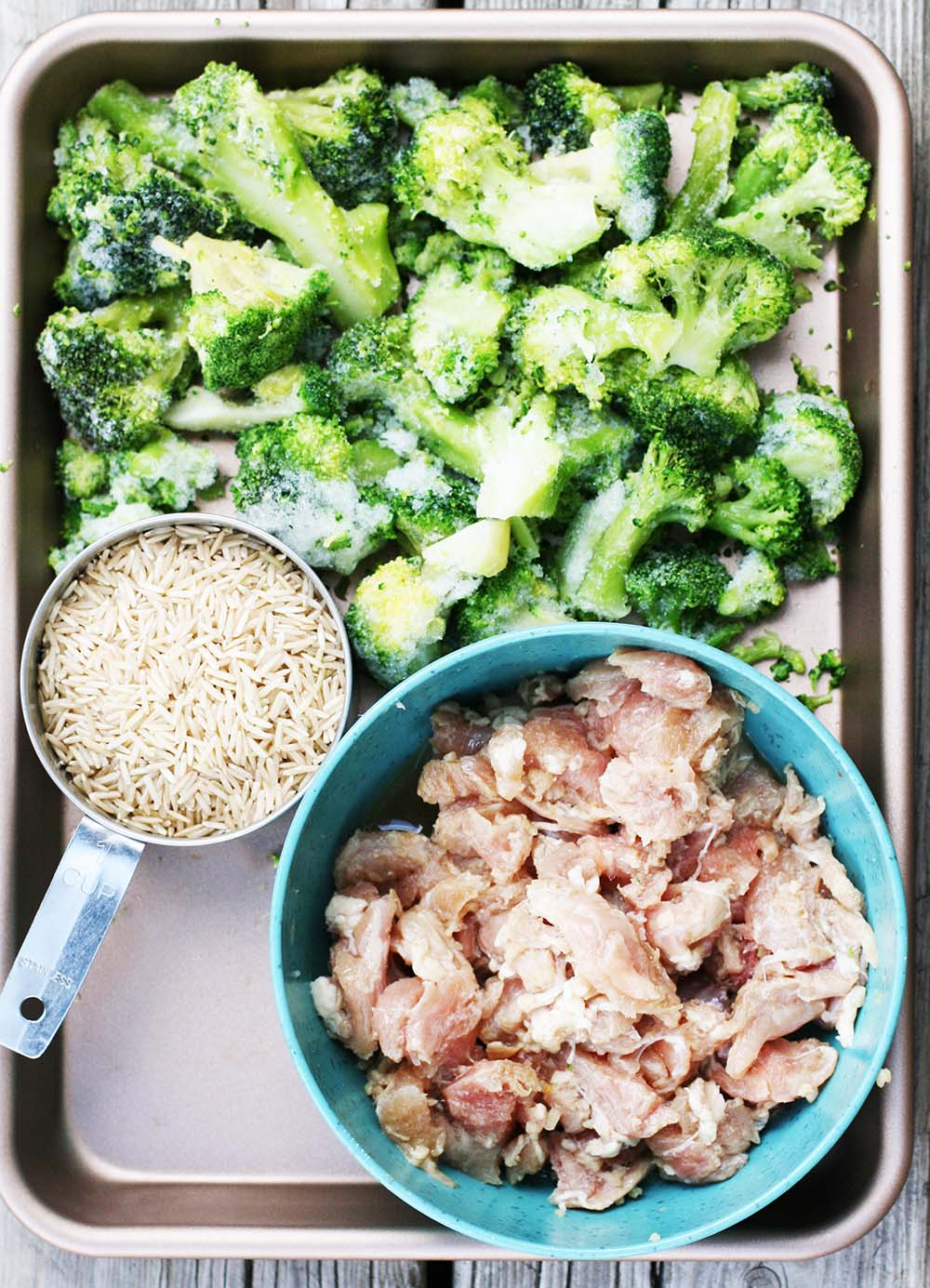 Sheet pan chicken and broccoli bowls: Clean out your fridge and freezer and make a great meal.