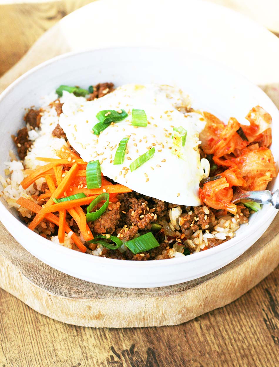 Gochujang ground beef bowls, topped with a fried egg. Affordable dinner in 20.