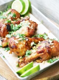 How to make Thai peanut chicken drumsticks in the slow cooker. Click through for recipe.