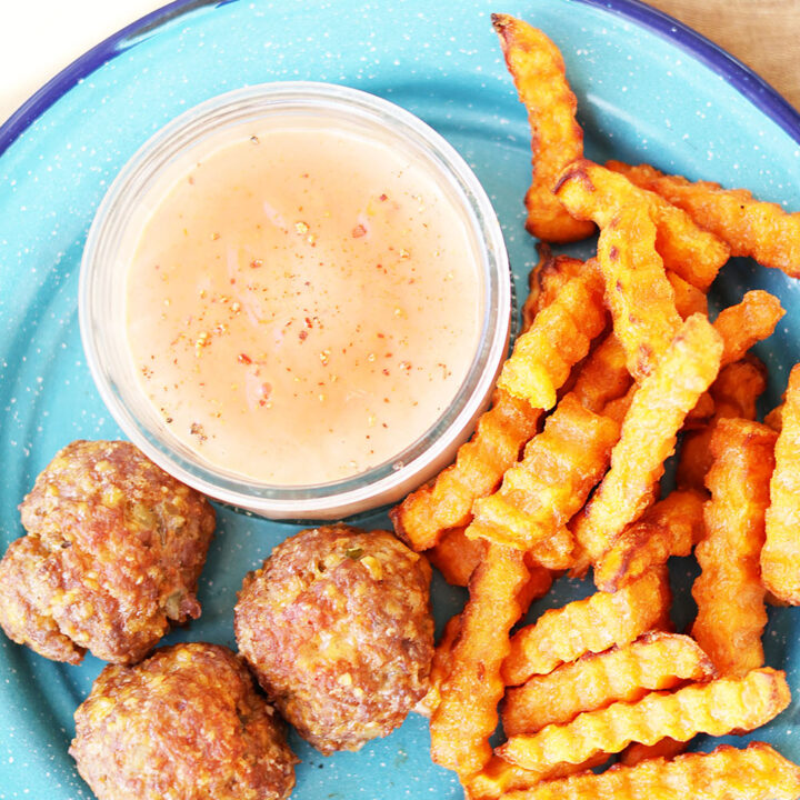 Cheeseburger meatballs served with a simple burger sauce & Sweet potato fries.