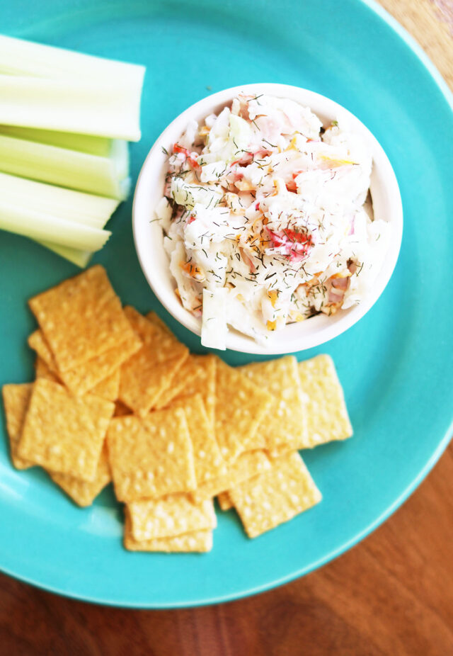 Deli-style imitation crab salad with crackers and celery