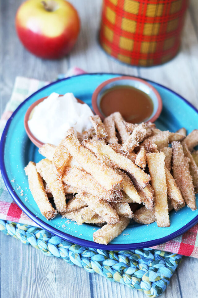 Apple fries with caramel sauce and whipped cream